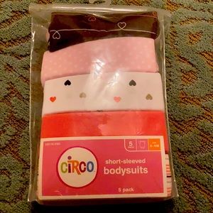 New in package five pack a bodysuit short sleeved